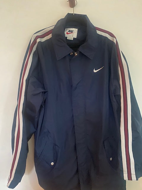 Pre-Owned Nike Navy Nylon Anorak with Stripe Sleeve detail.