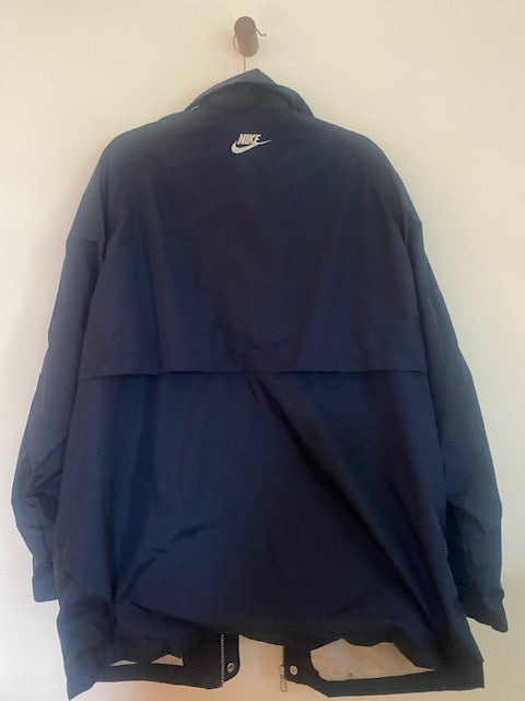 Pre-Owned Nike Navy Nylon Anorak with Stripe Sleeve detail.