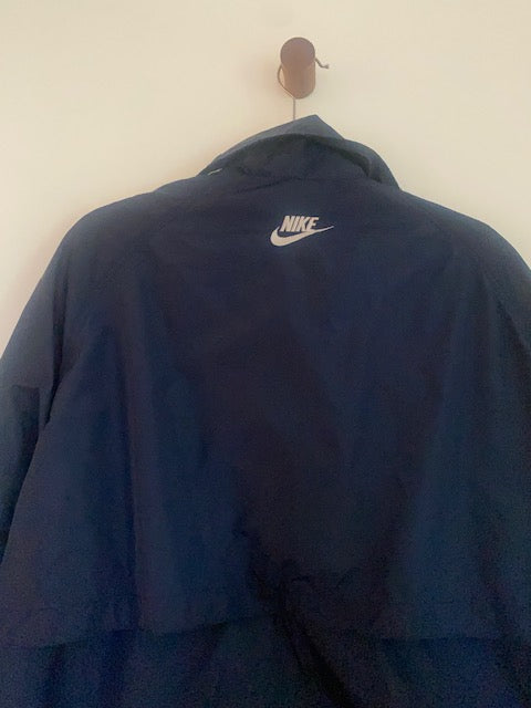 Pre-Owned Nike Navy Nylon Anorak with Stripe Sleeve detail.