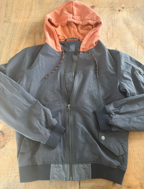 NEWNORM Upcylced Hooded Bomber Jacket with Orange knit Hood.