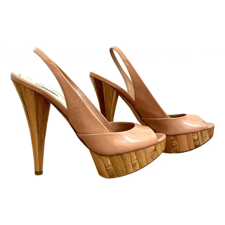 Pre-Owned Miu Miu Nude Patent with Bamboo Stiletto Heel.